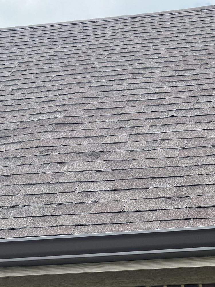 Slide of Tucker Roofing Systems