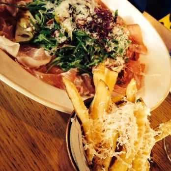 Jamie's Italian - Serrano Salad with Parmesan, shaved pear and pine nuts - as side here truffle fries - Italian Near Me - Dundrum, D Jamie's Italian - Serrano Salad with Parmesan, shaved pear and pine nuts - as side here truffle fries - Italian Near Me - Dundrum, D