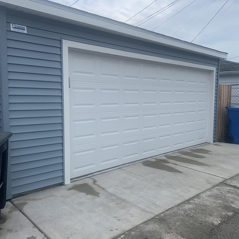 Fisher Garages - a garage with a trash can in front of it - General Contractors Near Me - Chicago, Illinois Fisher Garages - a garage with a trash can in front of it - General Contractors Near Me - Chicago, Illinois