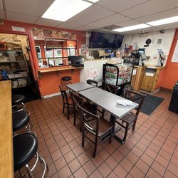 Pita Kabob Grill - One table + stools around the perimeter.