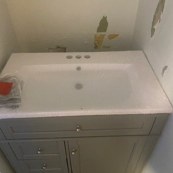 Renovate Ease - Flooded uninstalled vanity. - General Contractors Near Me - Ogden, Utah Renovate Ease - Flooded uninstalled vanity. - General Contractors Near Me - Ogden, Utah