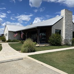 Exterior outside entrance of Dripping Springs Distilling - The main house - Dripping Springs, Texas Exterior outside entrance of Dripping Springs Distilling - The main house - Dripping Springs, Texas