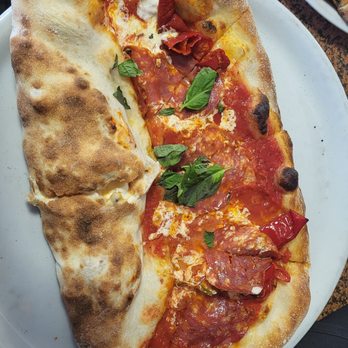 Se7te Woodfire Pizza - Mezzaluna, half calzone and half pizza. I chose the Diavola pizza and pepperoni in the calzone. IT WAS DELICIOUS. - Pizza Near Me - Totowa, New Jersey Se7te Woodfire Pizza - Mezzaluna, half calzone and half pizza. I chose the Diavola pizza and pepperoni in the calzone. IT WAS DELICIOUS. - Pizza Near Me - Totowa, New Jersey