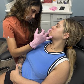 Siren Glow Aesthetics - Dr. Chandrasekaran performing lip filler! - Medical Spas Near Me - Augusta, Georgia