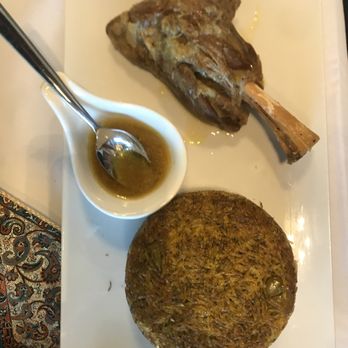 Parseh - a plate of food with a spoon and sauce - Persian/Iranian Near Me - Thornhill, Ontario