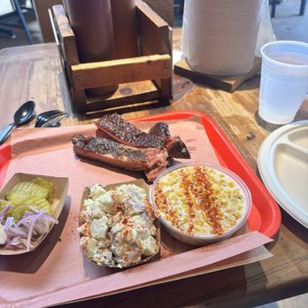 Terry Black's Barbecue - 1/2lb pork ribs, cream corn, and potato salad. $27 - Barbeque Near Me - Dallas, Texas
