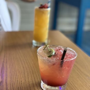 Shorebreak Lodge - Front: blackberry margarita, back: mango habanero punch - New American Near Me - Rehoboth Beach, Delaware Shorebreak Lodge - Front: blackberry margarita, back: mango habanero punch - New American Near Me - Rehoboth Beach, Delaware