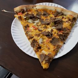 A Touch of Naples Pizza & Pasta - Cheeseburger slice - highly recommend, or should I even say required. Very tasty all around.