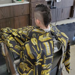 Corner Barber Shop - Mohawk for the summer.  Terrific work with setting the line.