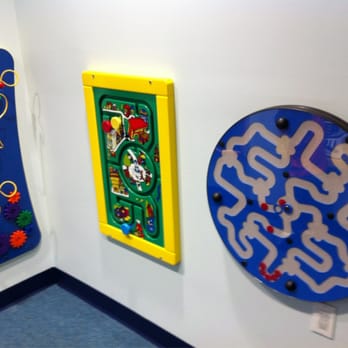 Park View Pediatric Dentistry & Orthodontics - Wall of toddler toys - Pediatric Dentists Near Me - New York, New York