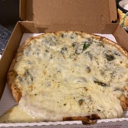Lula's Deli Corner - Here is the sloppy pizza white pizza suppose to have spinach on it was not worth what I had paid for it. I