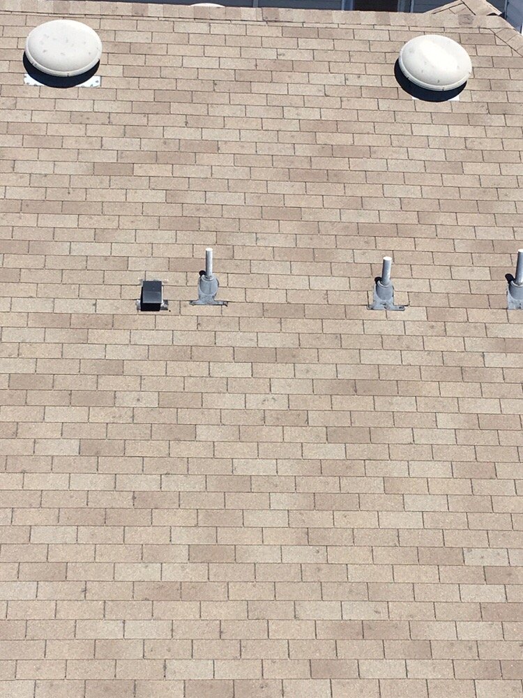 Slide of Chago's Roofing