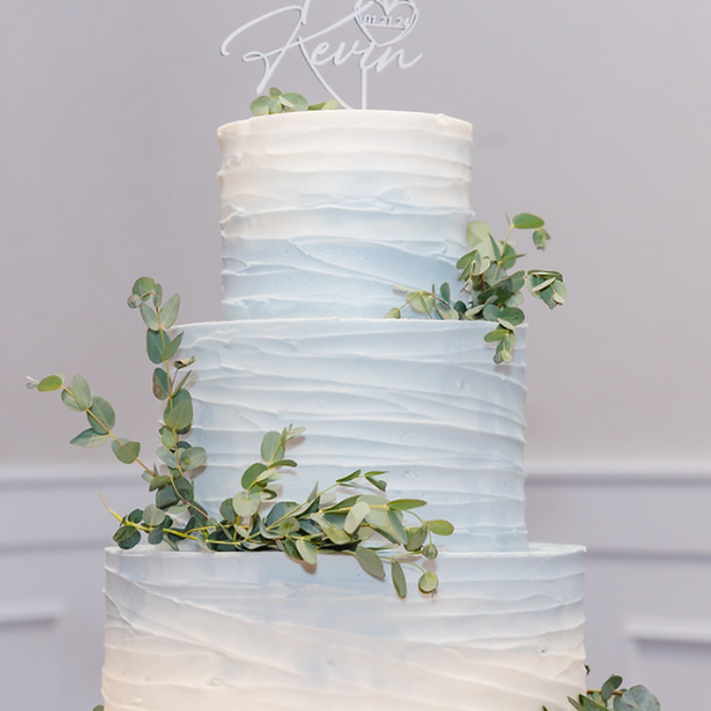 a three tiered wedding cake a three tiered wedding cake