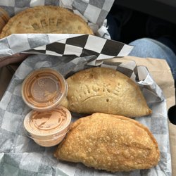All about Churros - Empanadas with sauce
