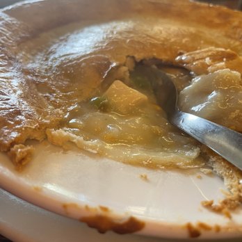 Someplace Else Restaurant - a plate of food with a fork in it - American Near Me - Elkhorn, Wisconsin