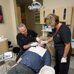 Clayton Dental - Dr. Ballard working with our assistant Chris!