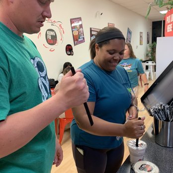 Kung Fu Tea - Popping straw into milk tea with boba - Bubble Tea Near Me - Jacksonville, Florida