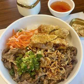 Golden Delight #1 - Vermicellis with grilled pork and fried egg rolls. One of the egg rolls is smaller than the other. Haha - Vietnamese Near Me - Rosemead, California
