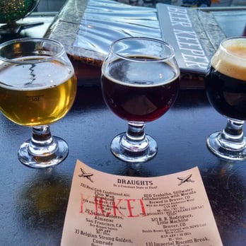 Hops & Pie - From left to right: Dry Hopped Saison, Double Brown Ale, and Oatmeal Stout on Nitro - Pizza Near Me - Denver, Colorado