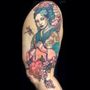 Looking Glass Tattoo & Gallery