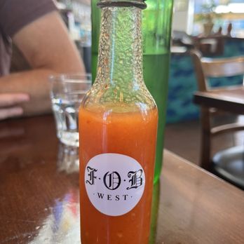 FOB Kitchen - Their own hot sauce - tangy with Thai chilis. - Filipino Near Me - Oakland, California FOB Kitchen - Their own hot sauce - tangy with Thai chilis. - Filipino Near Me - Oakland, California