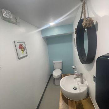 Orange Octopus Ice Cream - Restroom - Ice Cream & Frozen Yogurt Near Me - Sarasota, Florida Orange Octopus Ice Cream - Restroom - Ice Cream & Frozen Yogurt Near Me - Sarasota, Florida