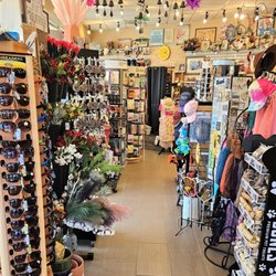 Sumas Drug - Sunglasses, faux flowers, magnets, wind chimes,