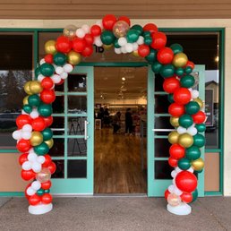 Exterior outside entrance of Giggles N Grins events - Christmas balloons arch Exterior outside entrance of Giggles N Grins events - Christmas balloons arch