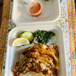 a meal in a styrofoam container