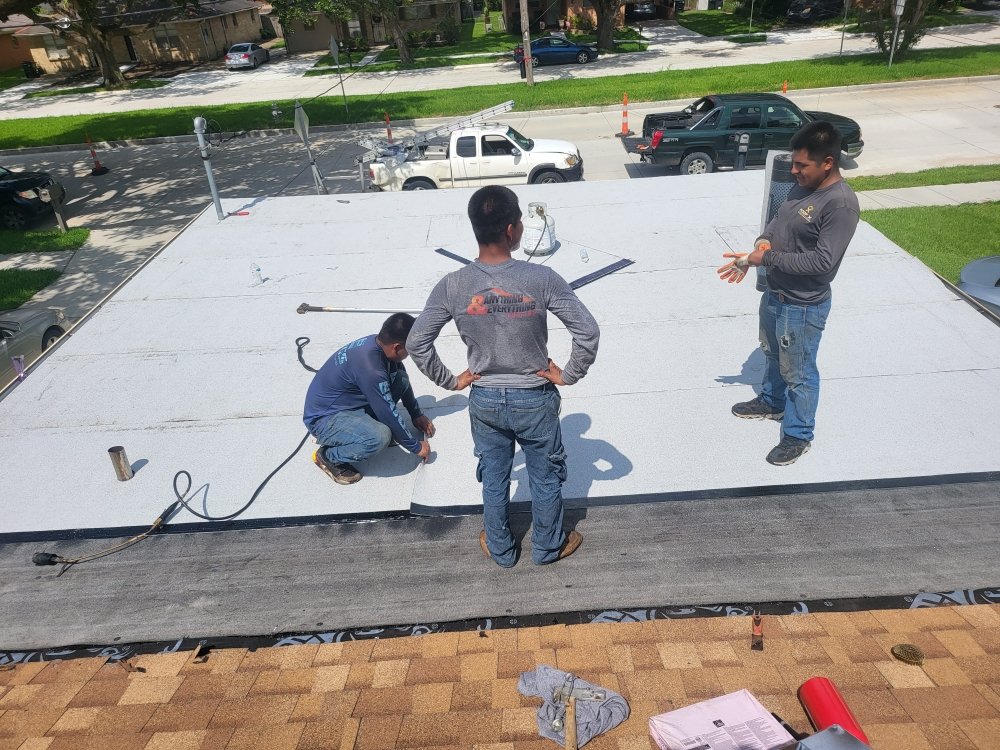 Slide of Anything & Everything Roofing