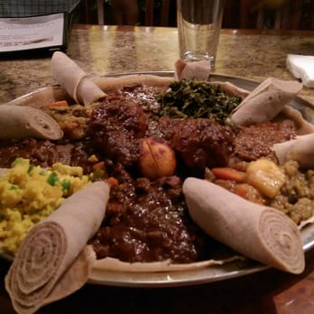 Alem Ethiopian Village - ES3 M2 sampler platter - Ethiopian Near Me - Milwaukee, Wisconsin Alem Ethiopian Village - ES3 M2 sampler platter - Ethiopian Near Me - Milwaukee, Wisconsin
