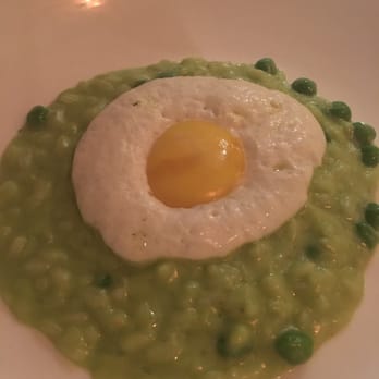 Mercantile - English pea risotto, truffle brined yolk, Parmesan truffle sabayon "egg white" - New American Near Me - Denver, Colorado Mercantile - English pea risotto, truffle brined yolk, Parmesan truffle sabayon "egg white" - New American Near Me - Denver, Colorado