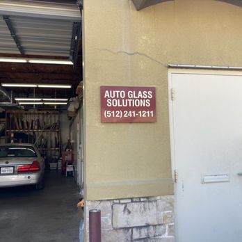 Auto Glass Solutions - Sign, door, car - Auto Glass Services Near Me - Austin, Texas