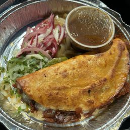 2 quesa-birria tacos $10 2 quesa-birria tacos $10