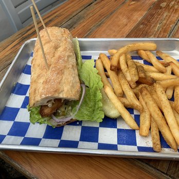 St. Augustine Seafood Company - Fish Po'Boy with fries - Seafood Near Me - St. Augustine, Florida St. Augustine Seafood Company - Fish Po'Boy with fries - Seafood Near Me - St. Augustine, Florida