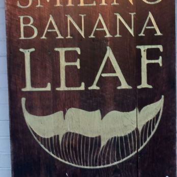Smiling Banana Leaf - Sign outside of restaurant... A whole in the wall in all the good ways - Thai Near Me - Pittsburgh, Pennsylvania Smiling Banana Leaf - Sign outside of restaurant... A whole in the wall in all the good ways - Thai Near Me - Pittsburgh, Pennsylvania