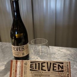 Bottle wine and glass along with wine club info Bottle wine and glass along with wine club info