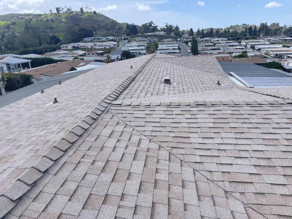 Slide of Balam Roofing