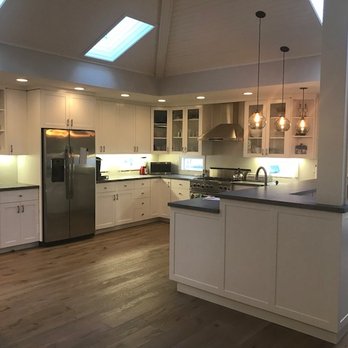 Complete Home Repair & Construction - New floors, cabinets (to match existing and it looks perfect), new lighting and counter, made structural beam a part of the bar, paint. - General Contractors Near Me - Greenbrae, California