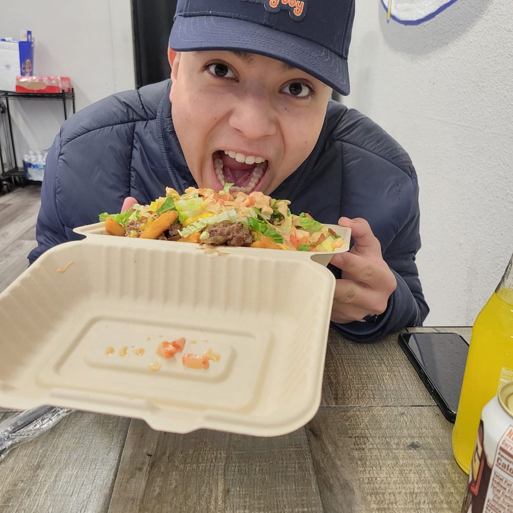 Cal's Fried Chicken & Burgers - Gio devouring his loaded fries!! - Burgers Near Me - Berkeley, California Cal's Fried Chicken & Burgers - Gio devouring his loaded fries!! - Burgers Near Me - Berkeley, California