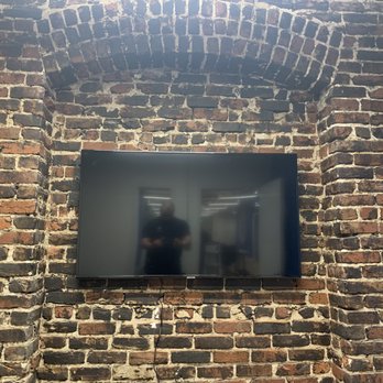 Wands & Hammers Tech - 55'' TV mounted on brick! Good times! - TV Mounting Near Me - San Francisco, California Wands & Hammers Tech - 55'' TV mounted on brick! Good times! - TV Mounting Near Me - San Francisco, California