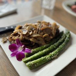 Steve's Steakhouse - 12oz New York Steak topped with grilled onions and mushrooms very delicious strongly recommend.