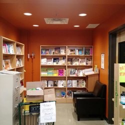Natural Grocers - Have a small selection of books in a little nook with a comfy chair.