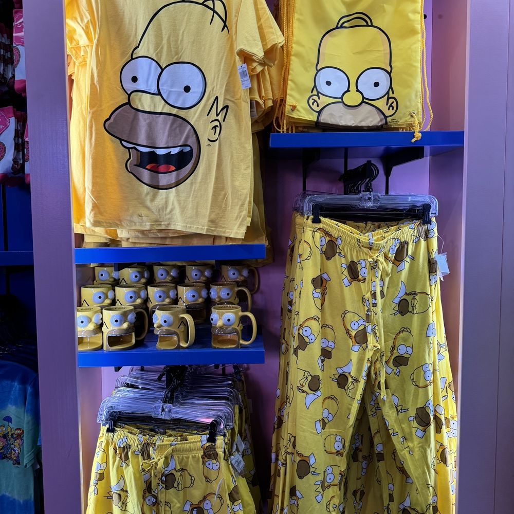 Kwik-E-Mart - ows a display of simpsons pajamas - Donuts Near Me - Universal City, California
