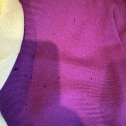 Holes in sweater after picking up from dry cleaner