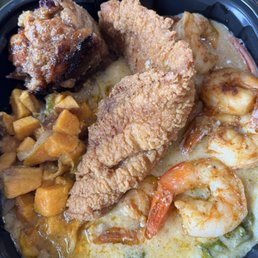 Shrimp and grits, fish, sweet potato hash and bread pudding.