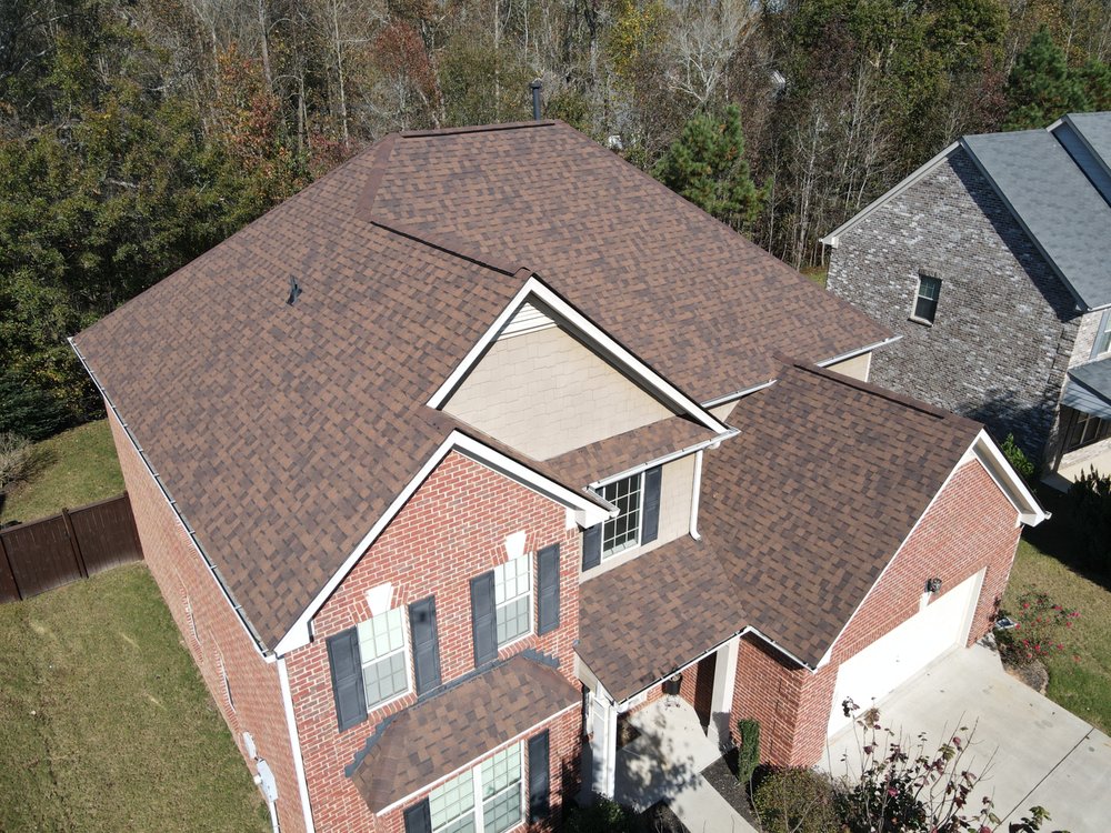 Slide of Firehouse Roofing