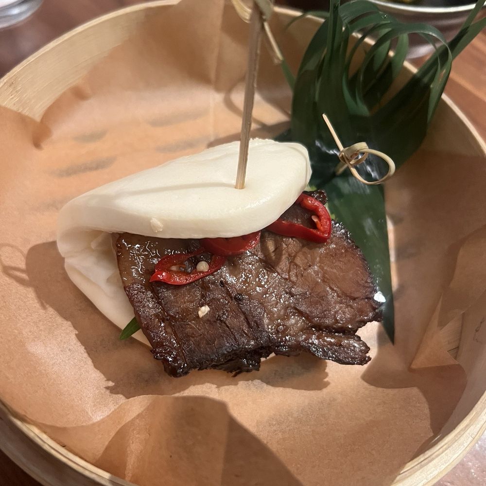 Bisutoro - Braised beef bao. Didn't like it AT ALL. this was $10... for 1 bao bun. Meat was really tough and the ginger on it was very off putting. - Ramen Near Me - Phoenix, Arizona