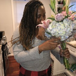 Surroundings - Wife smelling her flowers