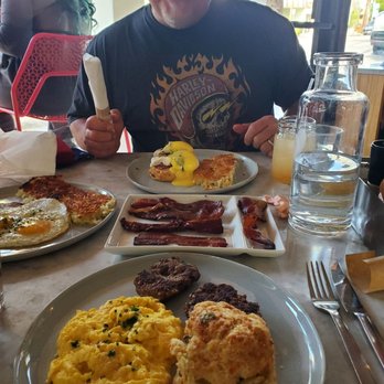 Cheeky's - Cheesy scrambled with chive biscuit, eggs Benedict, eggs over easy with bacon and hash browns plus the bacon flight. - Breakfast & Brunch Near Me - Palm Springs, California Cheeky's - Cheesy scrambled with chive biscuit, eggs Benedict, eggs over easy with bacon and hash browns plus the bacon flight. - Breakfast & Brunch Near Me - Palm Springs, California